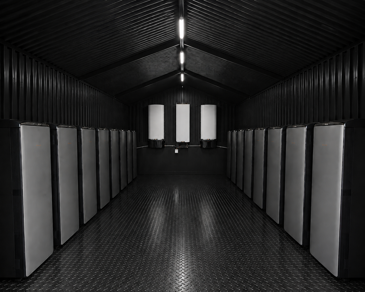 Interior of GridVault shed showing organized battery bank installation